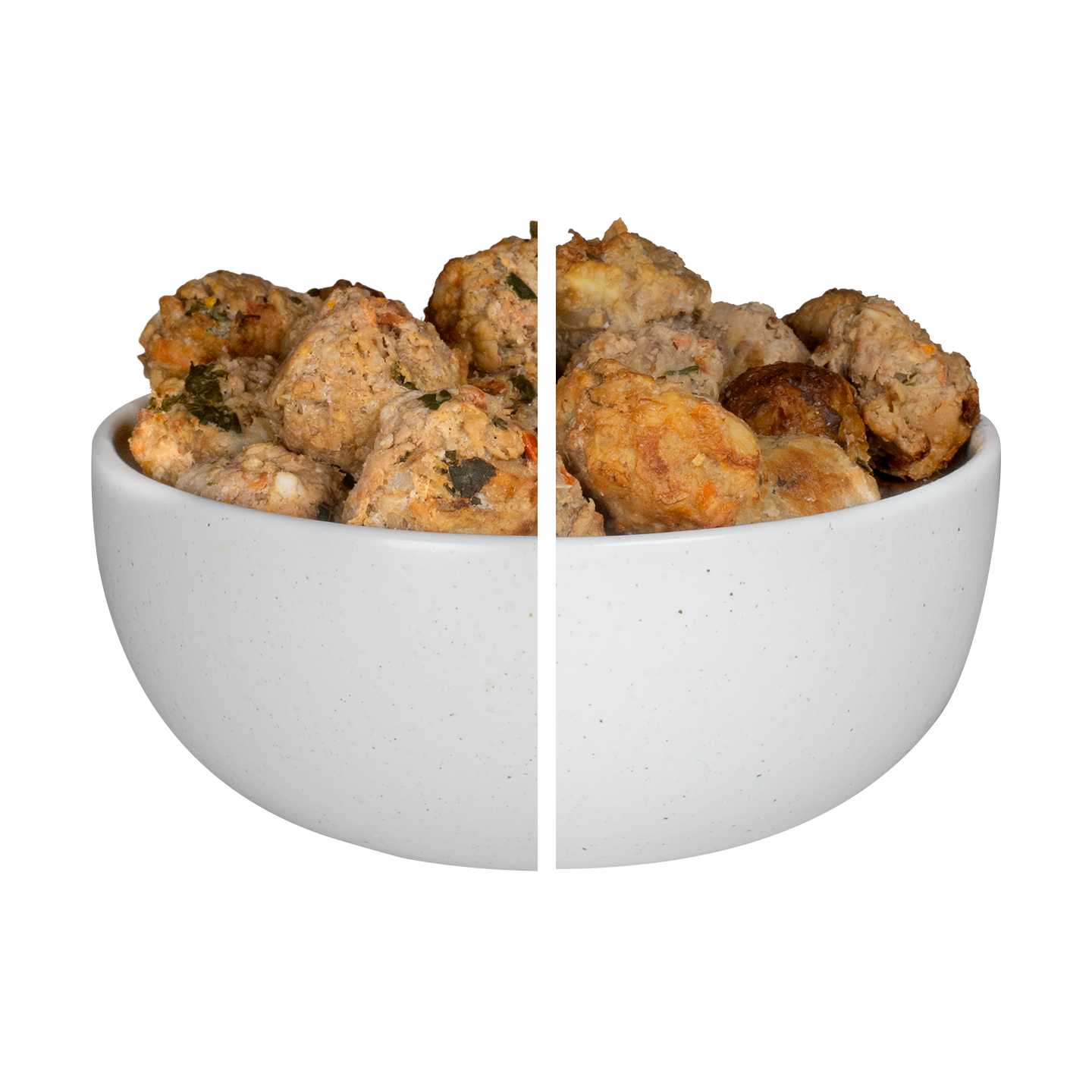 Closeup of turkey meatballs with fresh vegetables, fruit, and carrots for dogs