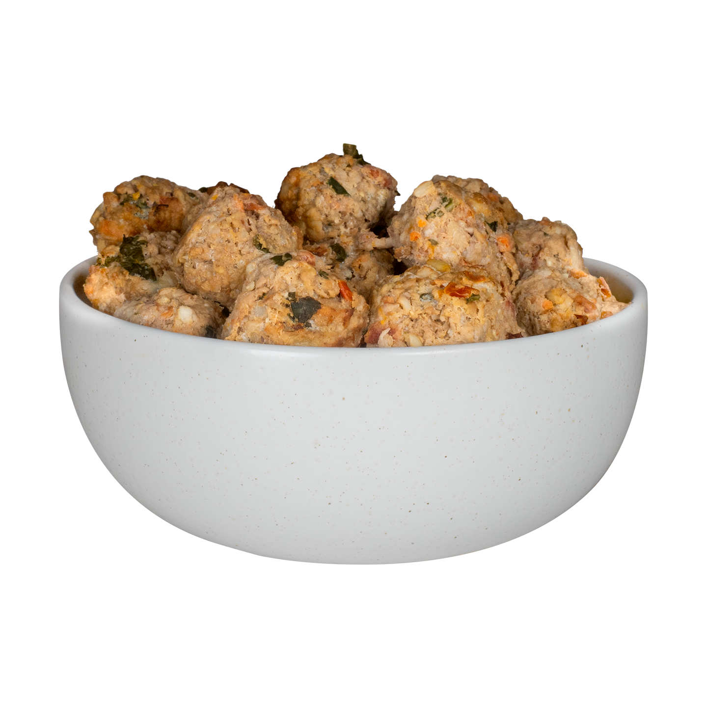 Closeup of a meatball with meat, veggies, and carrots for dogs
