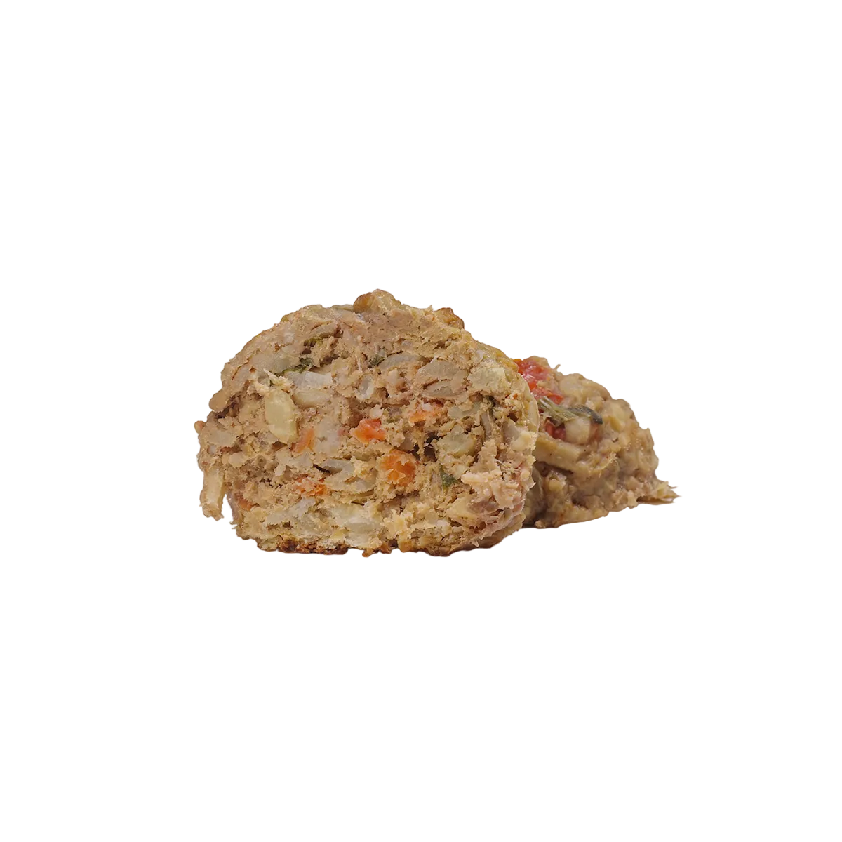 Closeup of turkey meatballs with fresh vegetables, fruit, and carrots for dogs